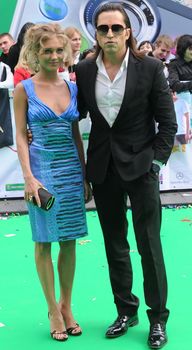 Глубокое декольте Кристины Асмус на церемонии «Муз ТВ» фото #3