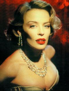 Красивая Кайли Миноуг в эротическом наряде для китайского журнала West East фото #5