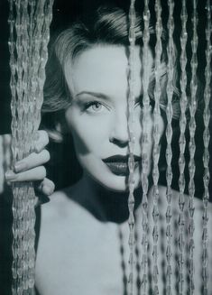 Красивая Кайли Миноуг в эротическом наряде для китайского журнала West East фото #9