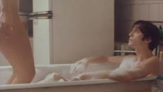 Голая грудь Евгении Игумновой в фильме «Тело будет предано земле, а старший мичман будет петь» фото #3