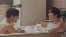 Голая грудь Евгении Игумновой в фильме «Тело будет предано земле, а старший мичман будет петь» фото #6