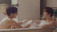 Голая грудь Евгении Игумновой в фильме «Тело будет предано земле, а старший мичман будет петь» фото #9