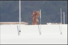 Памела Андерсон загорает топлесс на яхте в Сен-Тропе фото #11