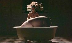 Голая Аманда Пламмер в фильме «8 1.2 женщин» фото #10