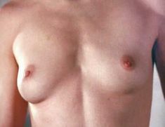 Голая грудь Бет Бродерик в фильме «Имплантаторы» фото #3