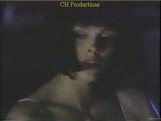 Голая Бриджит Нильсен в фильме «Домино» фото #17