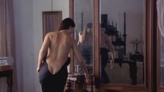 Моника Беллуччи оголила грудь в фильме «Под подозрением» фото #1